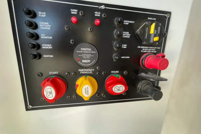 Slide: The Image of Control panel of a 2019 Monterey 295 Sport Yacht with various switches and indicators. - 35