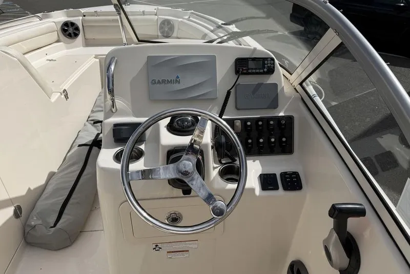 Slide: The Image of 2019 Grady-White Freedom 215 boat dashboard with Garmin navigation system. - 6