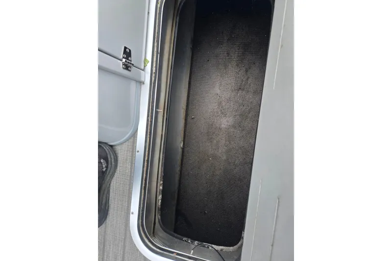 Slide: The Image of Storage compartment of 2020 Bentley Pontoons 220 Elite Swingback Dual Captain boat. - 14
