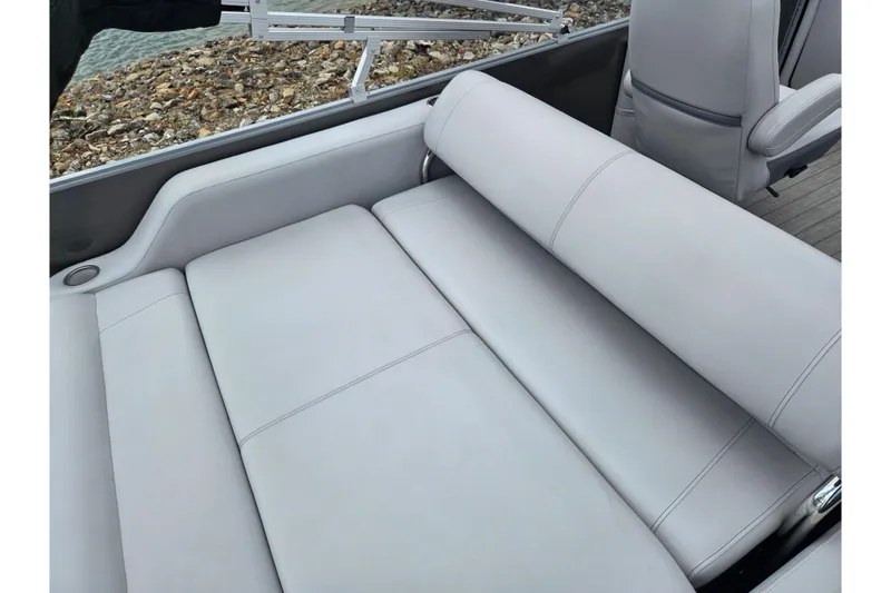 Slide: The Image of 2020 Bentley Pontoons 220 Elite Swingback Dual Captain with luxurious gray seating. - 20