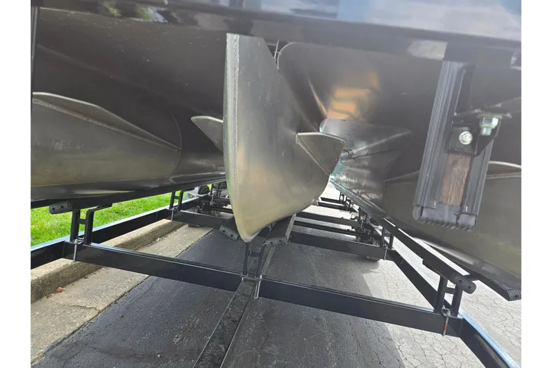 Slide: The Image of 2020 Bentley Pontoons 220 Elite Swingback Dual Captain underside view on trailer. - 8