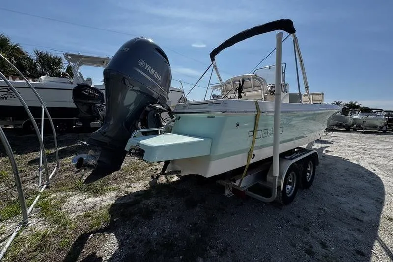 Slide: The Image of 2018 Robalo 226 Cayman boat on trailer with Yamaha outboard motor. - 4