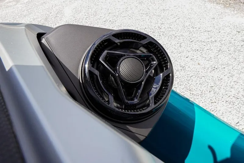 Slide: The Image of Close-up of 2026 Sea-Doo GTX Limited 325 speaker detail on a textured surface. - 18