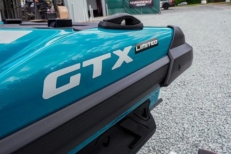 Slide: The Image of 2026 Sea-Doo GTX Limited 325, close-up of teal body with logo. - 7