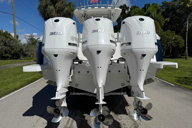 Slide: The Image of Triple Yamaha 300 engines on a 2012 Intrepid 400 Center Console boat. - 10