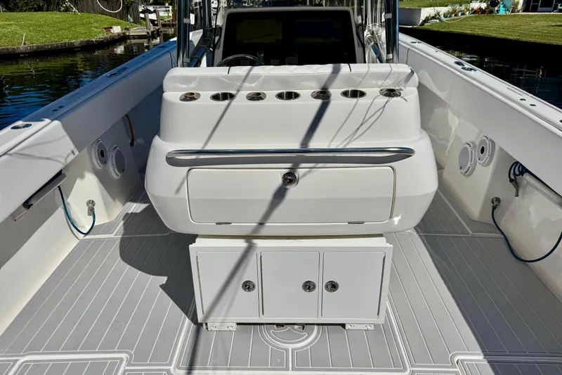 Slide: The Image of 2012 Intrepid 400 Center Console boat interior with seating and storage compartments. - 27