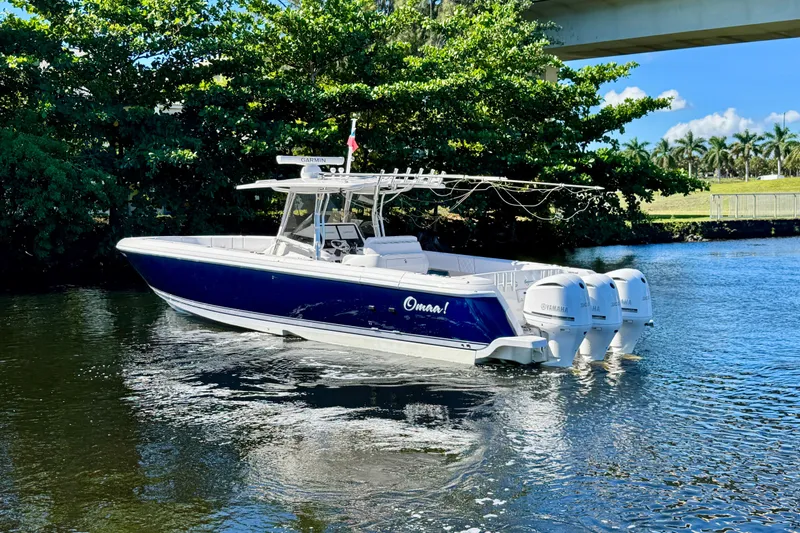 Slide: The Image of 2012 Intrepid 400 Center Console boat on a scenic waterway. - 4