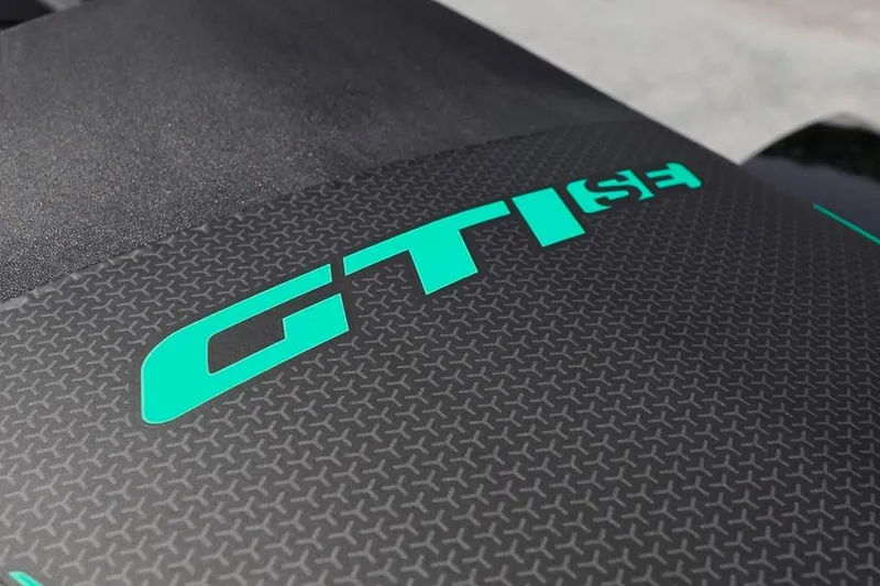 Slide: The Image of 2026 Sea-Doo GTI SE 170 logo on textured surface. - 3