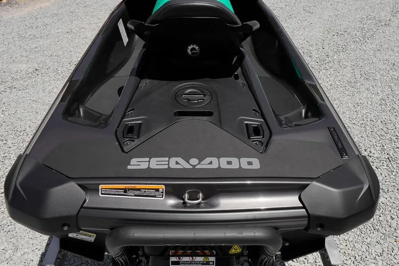 Slide: The Image of 2026 Sea-Doo GTI SE 170 jet ski rear view on gravel surface. - 7