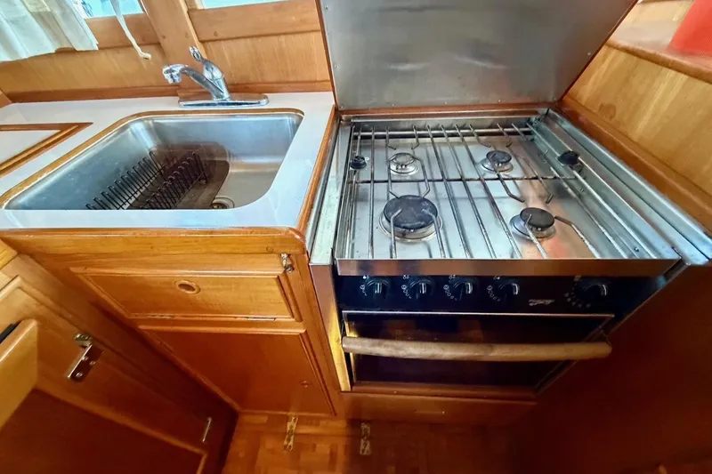 Slide: The Image of Galley kitchen in 1991 Grand Banks 36 Europa with stove and sink. - 25