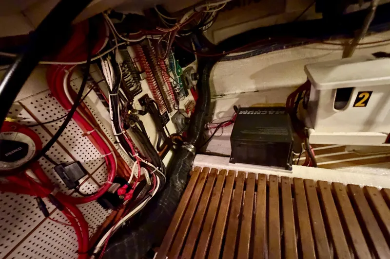 Slide: The Image of Engine room wiring and components of a 1991 Grand Banks 36 Europa boat. - 42