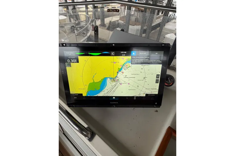 Slide: The Image of Garmin navigation display on 1991 Grand Banks 36 Europa boat, showing nautical chart. - 60