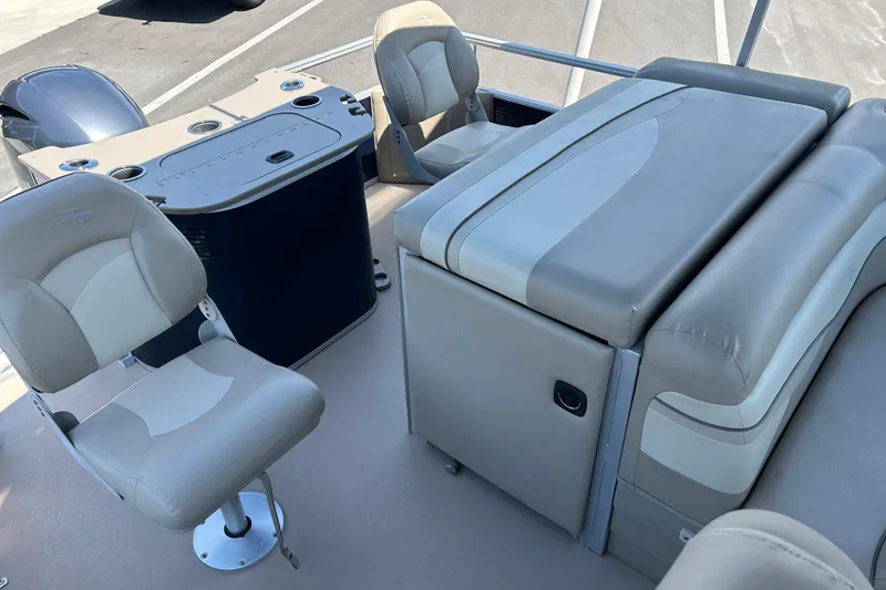Slide: The Image of 2015 Bennington 22 SSX boat interior with comfortable seating and modern design. - 13