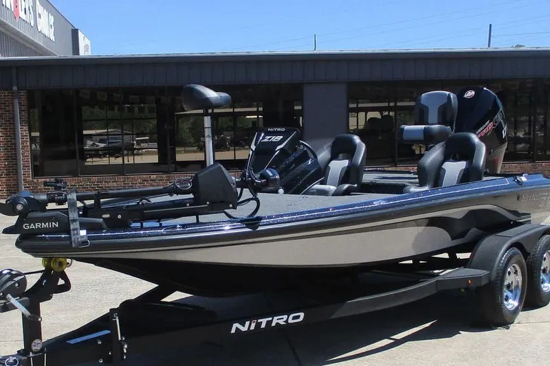 Slide: The Image of 2026 Nitro Z18 Pro fishing boat with Garmin equipment on a trailer. - 12
