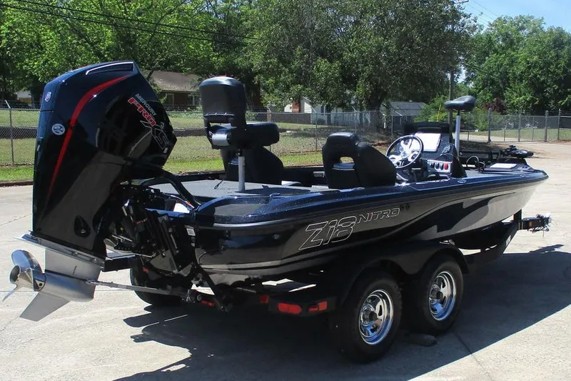 Slide: The Image of 2026 Nitro Z18 Pro boat on trailer, featuring powerful outboard motor. - 3