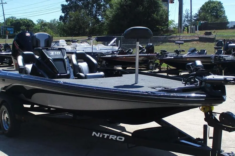 Slide: The Image of 2026 Nitro Z18 Pro fishing boat on trailer, parked outdoors. - 7