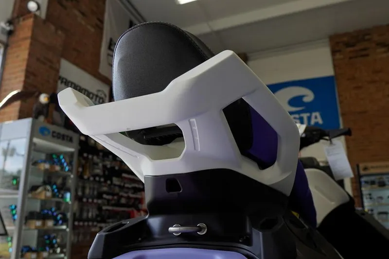 Slide: The Image of 2026 Sea-Doo Spark for 3 jet ski seat detail in showroom. - 10