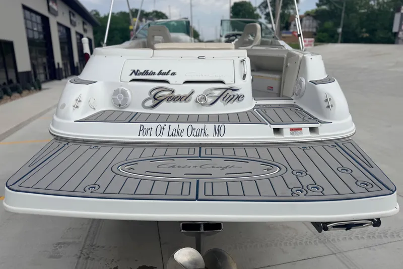 Slide: The Image of 2000 Chris Craft 262 Sport Deck boat at Port of Lake Ozark, MO. - 12
