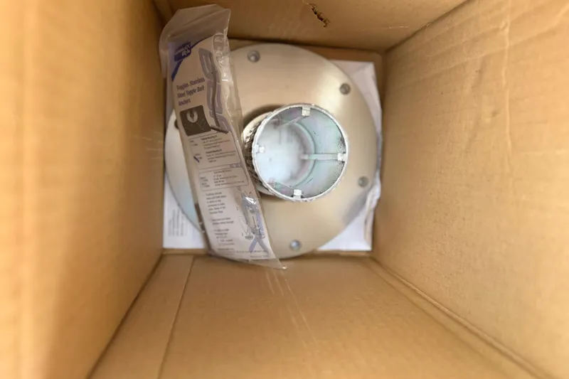 Slide: The Image of Cardboard box containing a Chris Craft 262 Sport Deck part, year 2000, with instructions. - 28