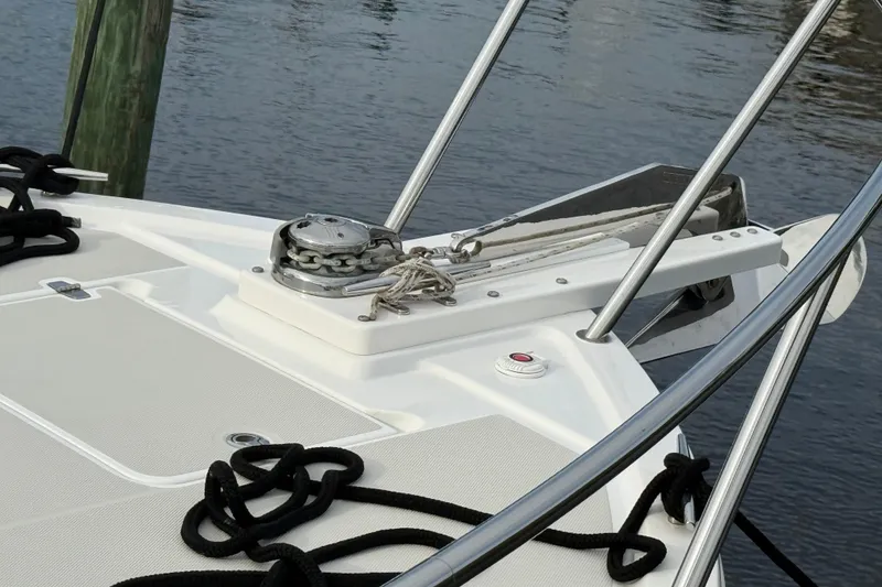 Slide: The Image of Luxurious beige seating inside a 2011 Back Cove Downeast 37 boat cabin. - 5