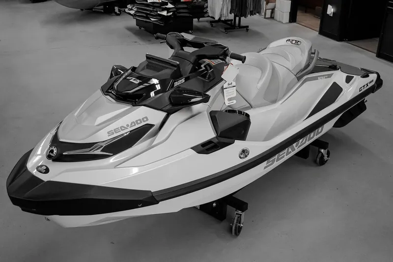 The Image of 2026 Sea-Doo GTX Limited 325 jet ski in showroom, showcasing sleek design and advanced features. - 1
