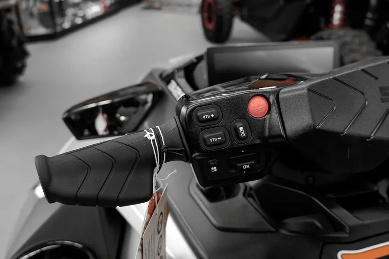 Slide: The Image of Handlebar controls of 2026 Sea-Doo GTX Limited 325, featuring start/stop button and VTS controls. - 12