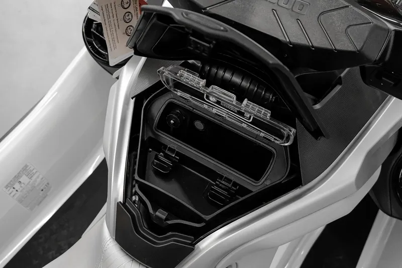 Slide: The Image of 2026 Sea-Doo GTX Limited 325 storage compartment, open view, showcasing interior design. - 14