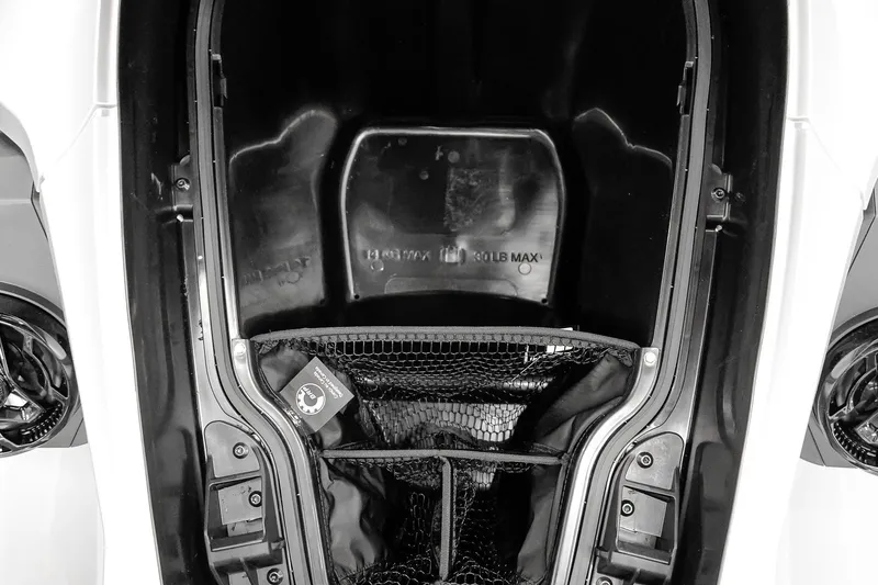 Slide: The Image of Storage compartment of 2026 Sea-Doo GTX Limited 325, featuring spacious interior and netting. - 24