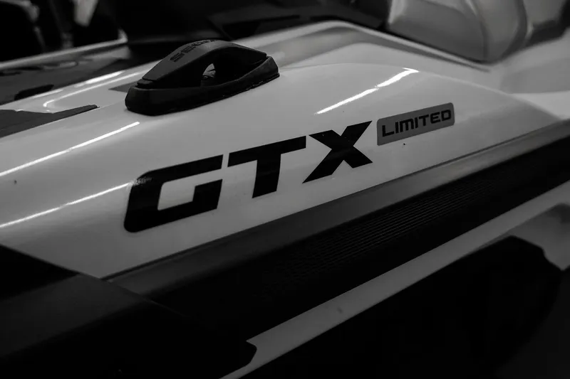 Slide: The Image of 2026 Sea-Doo GTX Limited 325, close-up of model branding in monochrome. - 5