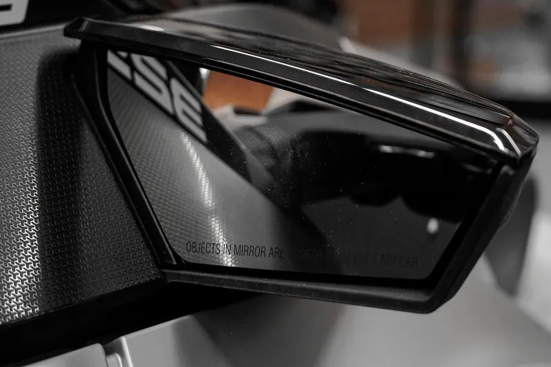 Slide: The Image of Close-up of 2026 Sea-Doo GTX Limited 325 side mirror with reflection warning. - 8