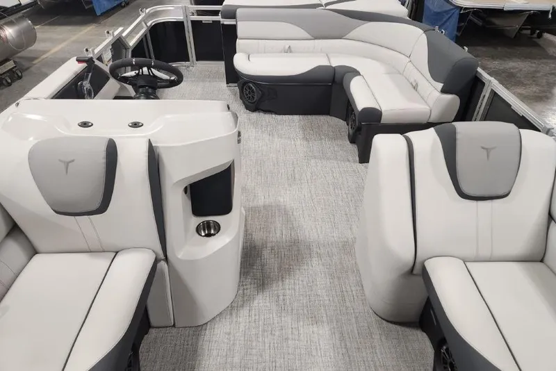 Slide: The Image of 2026 Tahoe Pontoon 1985 LTZ Cruise interior with plush seating and modern design. - 16