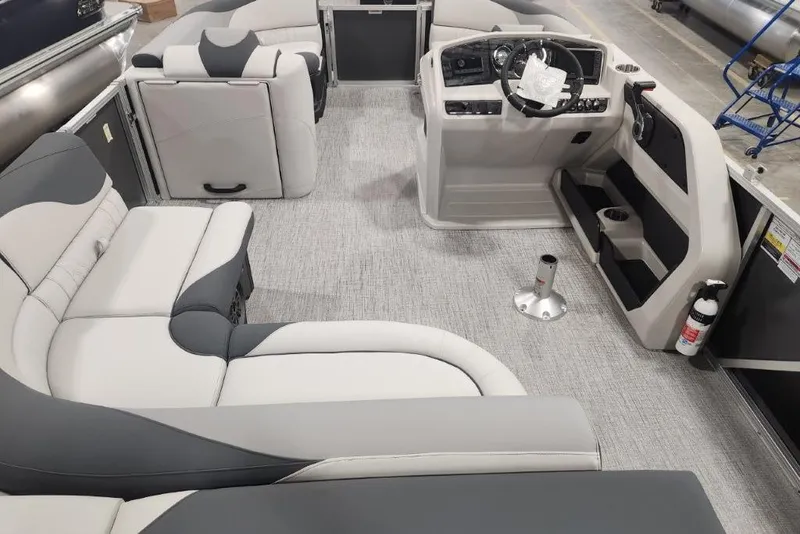 Slide: The Image of Interior of 2026 Tahoe Pontoon 1985 LTZ Cruise, featuring plush seating and modern helm. - 3