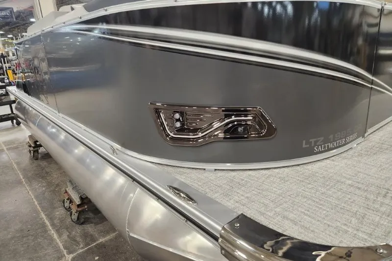 Slide: The Image of 2026 Tahoe Pontoon 1985 LTZ Cruise Saltwater Series, sleek silver exterior detail. - 5