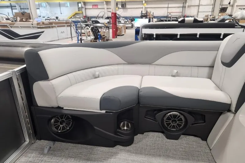Slide: The Image of 2026 Tahoe Pontoon 1985 LTZ Cruise interior with stylish seating and built-in speakers. - 6