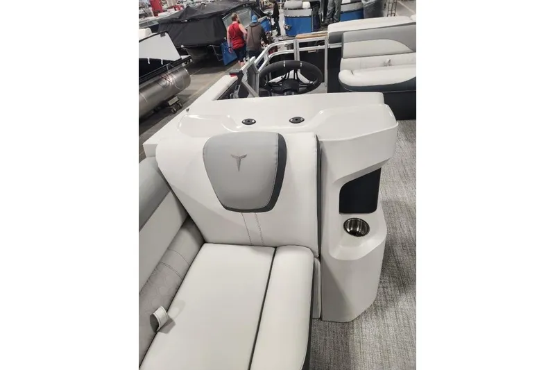 Slide: The Image of 2026 Tahoe Pontoon 1985 LTZ Cruise interior with plush seating and modern design. - 7