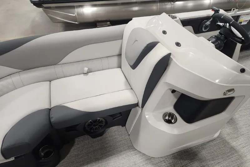 Slide: The Image of 2026 Tahoe Pontoon 1985 LTZ Cruise interior with sleek seating and modern console design. - 8