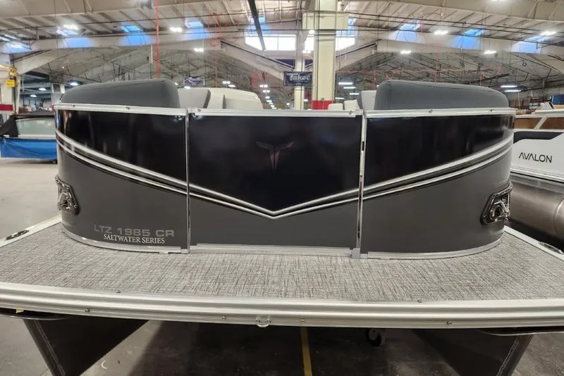 Slide: The Image of 2026 Tahoe Pontoon 1985 LTZ Cruise Saltwater Series in a showroom setting. - 9