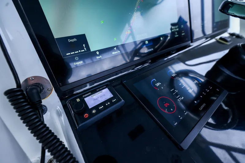 Slide: The Image of Control panel of a 2020 Yellowfin 42 Offshore boat with Garmin displays. - 31