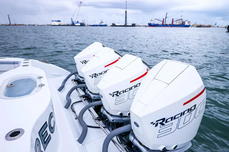 Slide: The Image of 2020 Yellowfin 42 Offshore boat with triple Racing 300 engines on water. - 44