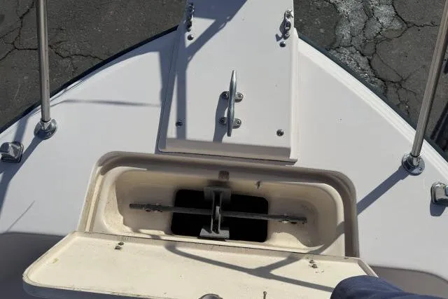 Slide: The Image of Bow of 1996 Grady-White Sailfish 272 with open anchor compartment. - 20