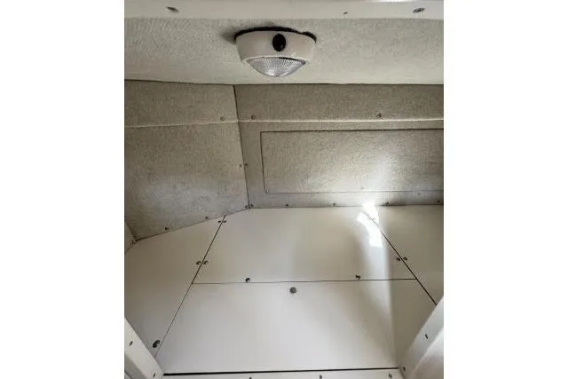 Slide: The Image of Interior cabin ceiling of 1996 Grady-White Sailfish 272 boat with light fixture. - 30