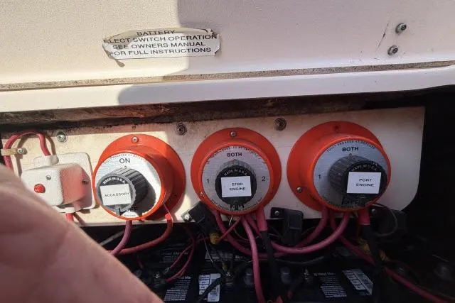 Slide: The Image of Battery switches on a 1996 Grady-White Sailfish 272 boat, labeled for engine control. - 32