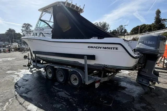 Slide: The Image of 1996 Grady-White Sailfish 272 boat on trailer with Yamaha outboard motor. - 5