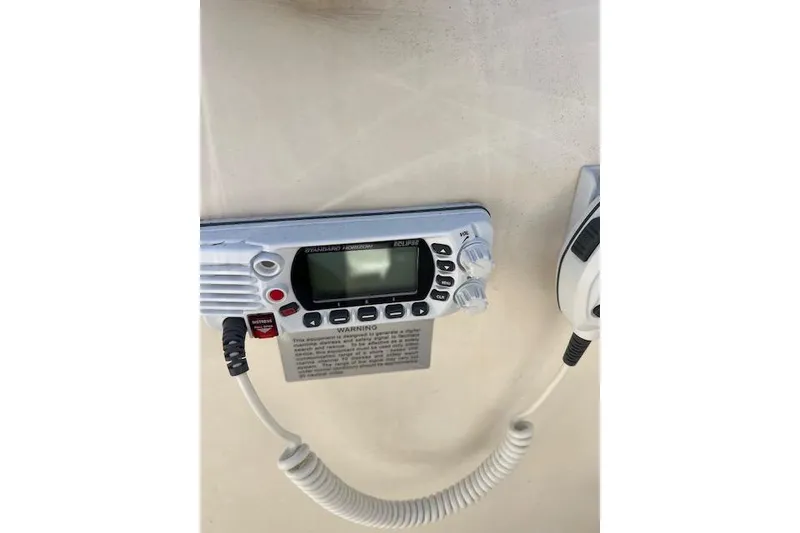 Slide: The Image of VHF marine radio on 2001 Seapro 235 WAC boat dashboard. - 8