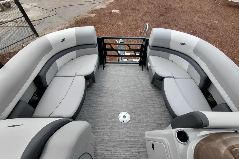 Slide: The Image of 2026 Starcraft EXS 1 Q DH boat interior with gray seating and modern design. - 14