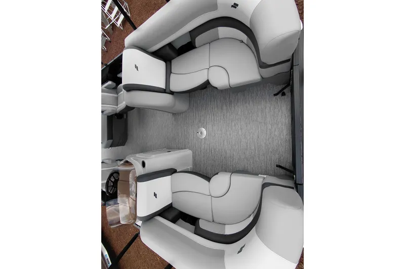 Slide: The Image of 2026 Starcraft EXS 1 Q DH boat interior with gray seating and flooring. - 16