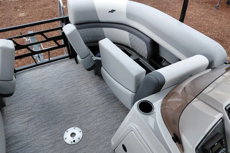 Slide: The Image of 2026 Starcraft EXS 1 Q DH boat interior with plush seating and modern design. - 19