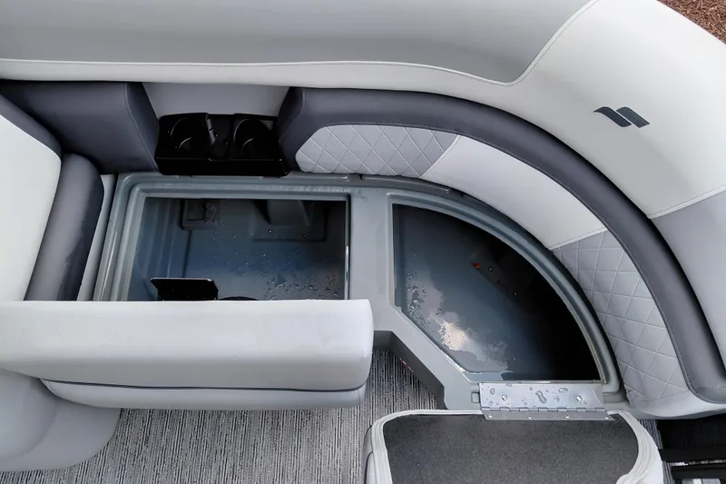 Slide: The Image of Interior view of 2026 Starcraft EXS 1 Q DH boat seating with storage compartment. - 20