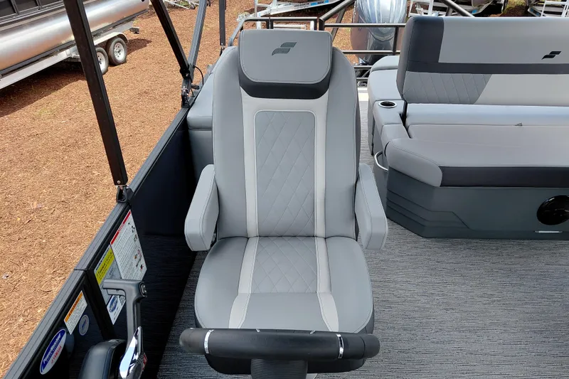 Slide: The Image of Captain's chair in 2026 Starcraft EXS 1 Q DH boat, featuring modern design and comfort. - 25
