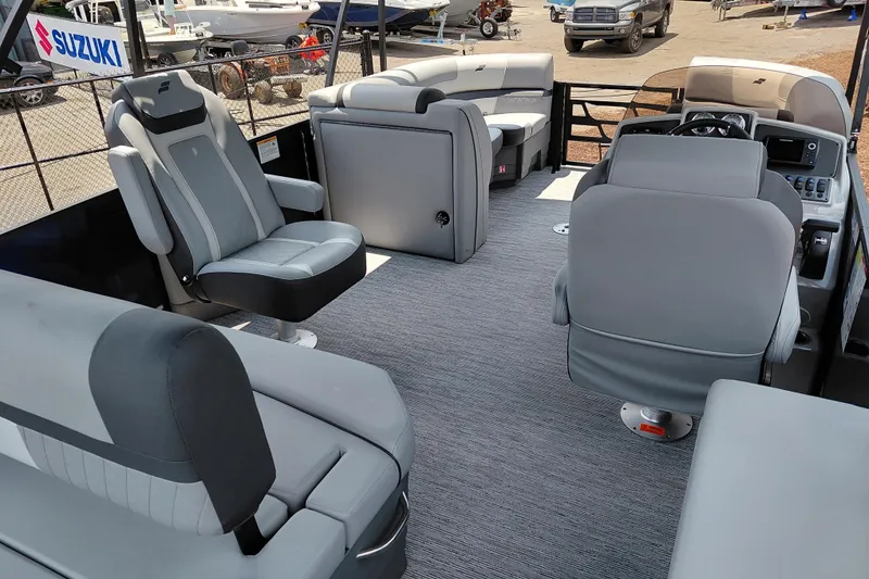 Slide: The Image of 2026 Starcraft EXS 1 Q DH boat interior with gray seating and modern design. - 39